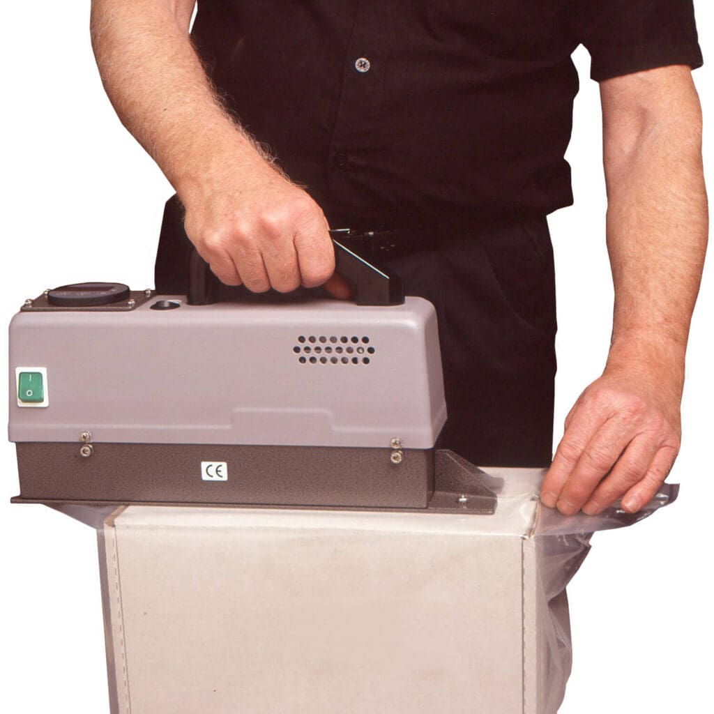 Handheld Band Sealer hand held band sealer in use Handheld Band Sealer hand held band sealer in use